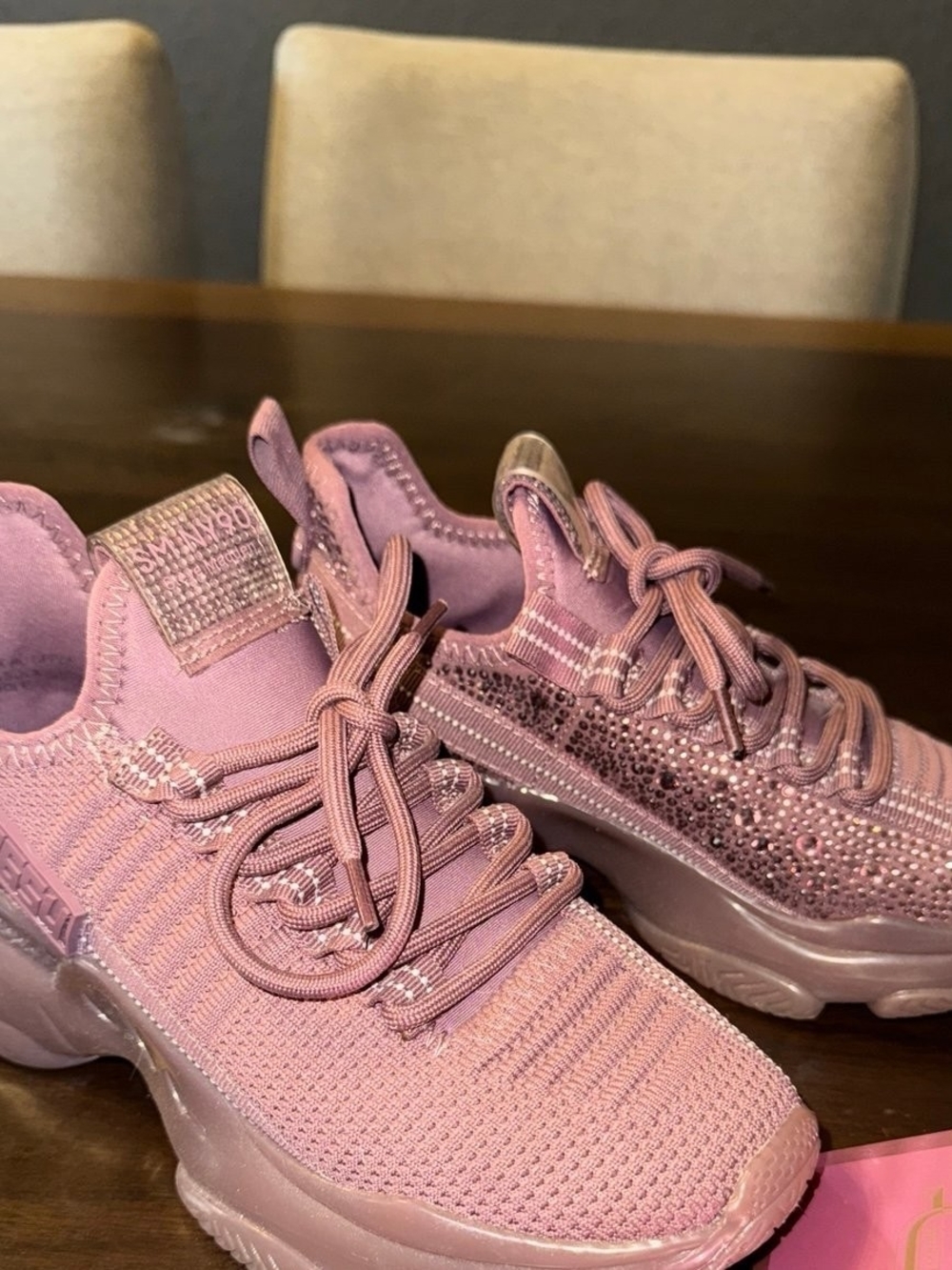 Steve Madden Maxima sneakers in a mauve or pink color featuring rhinestone embel